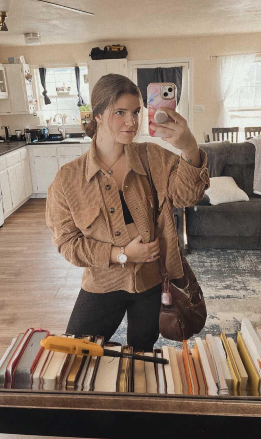 woman taking a selfie in a mirror