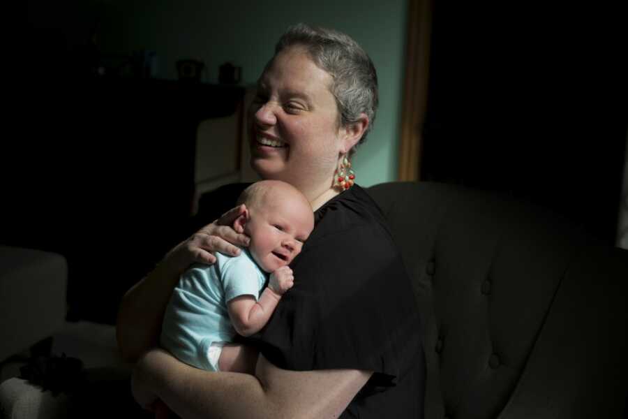 woman who beat cancer holding her daughter