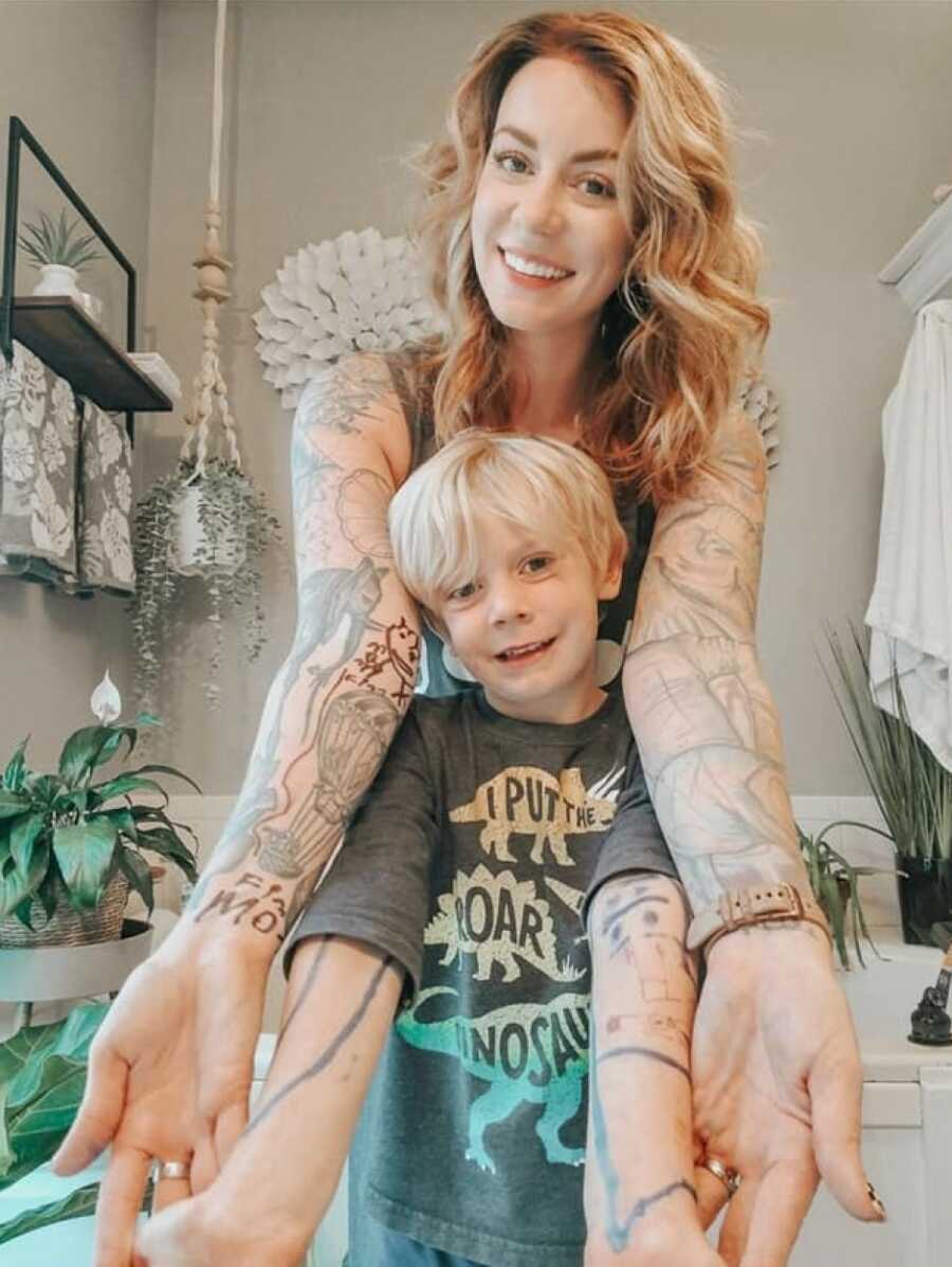 mom with her son taking a sweet picture