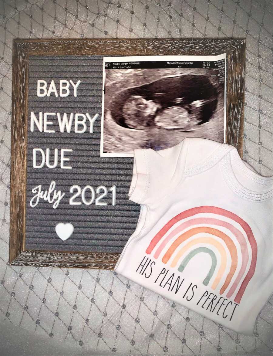 framed Sonogram of rainbow baby with July 2021 due date and a shirt with a rainbow that says his plan is perfect 