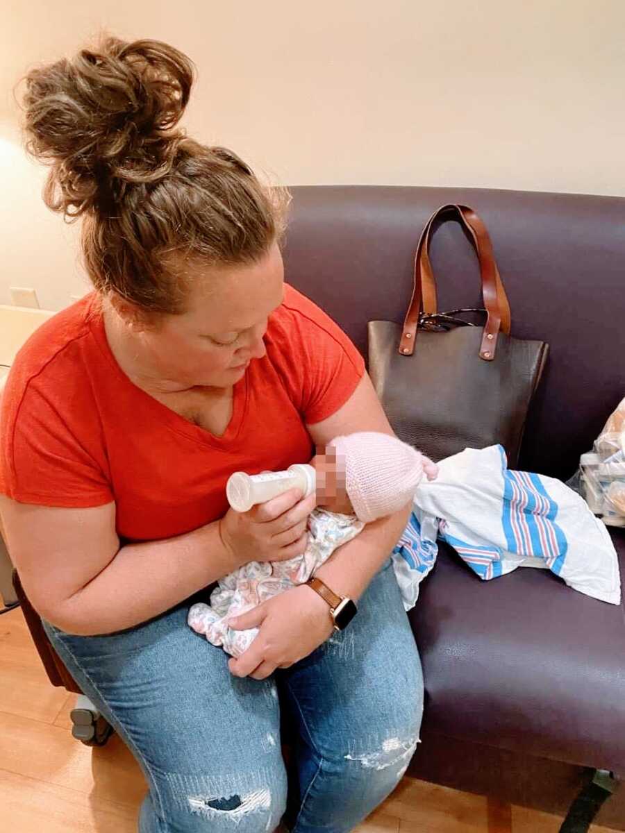 Foster mom bottle feeds newborn foster daughter