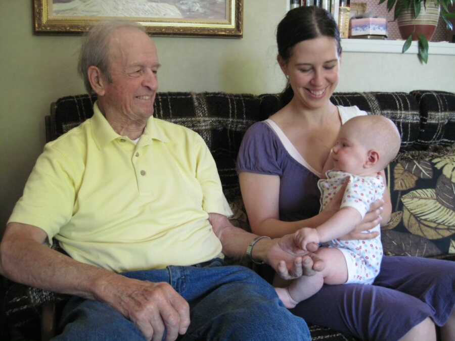 grandpa and granddaughter with great grand child
