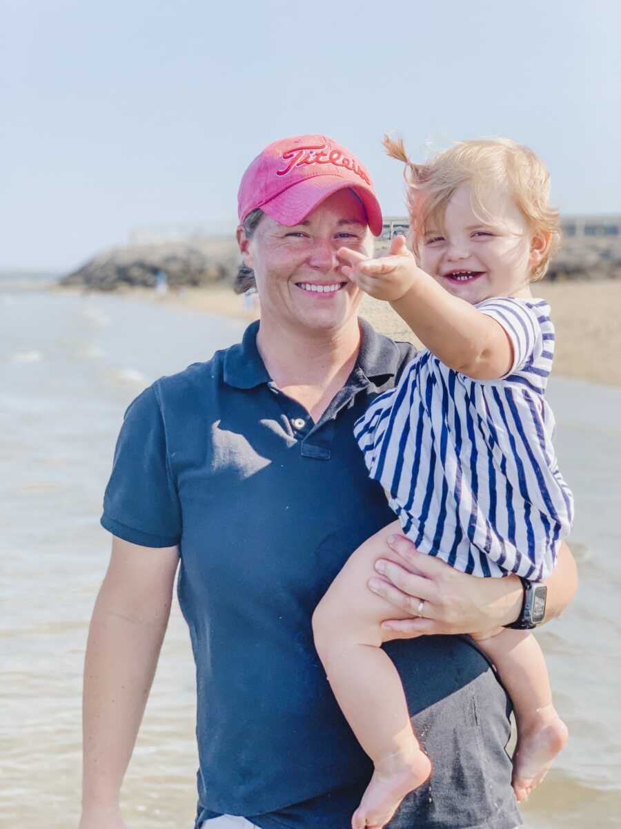 mom and daughter taking a picture together