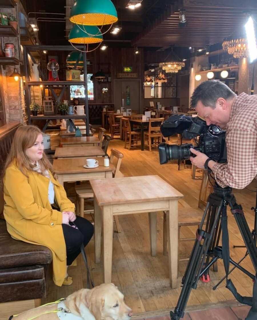 woman and guide dog getting ready for interviews