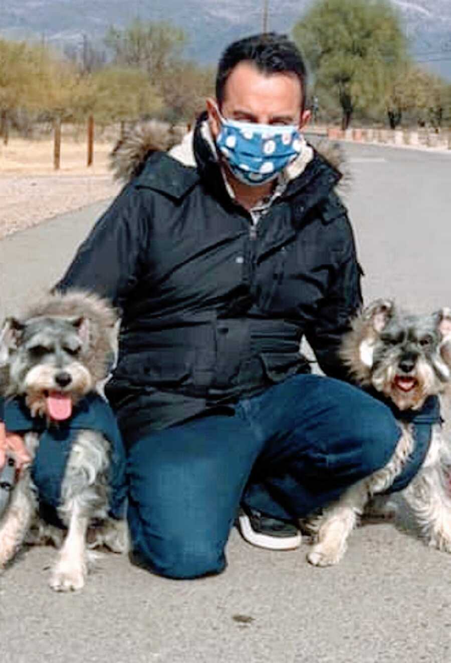 A former inmate with his two schnauzers