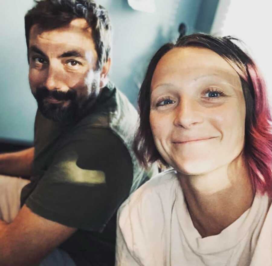 woman and her husband taking a selfie together