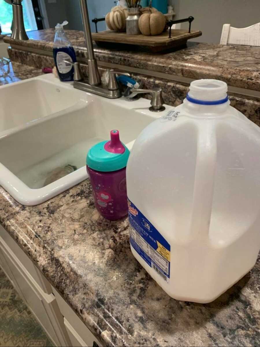 mom getting her kids milk ready