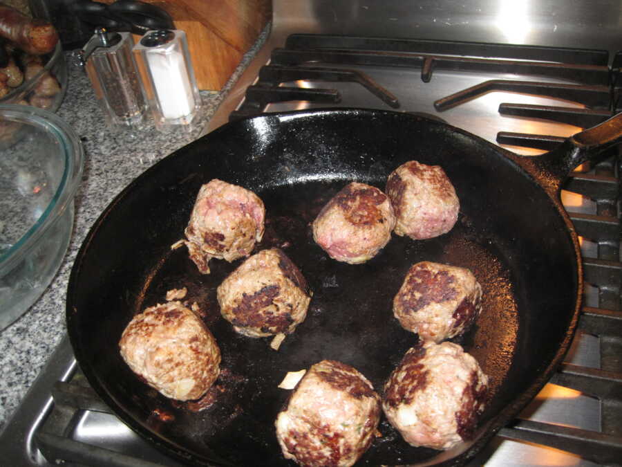 meatballs cooking in the pa
