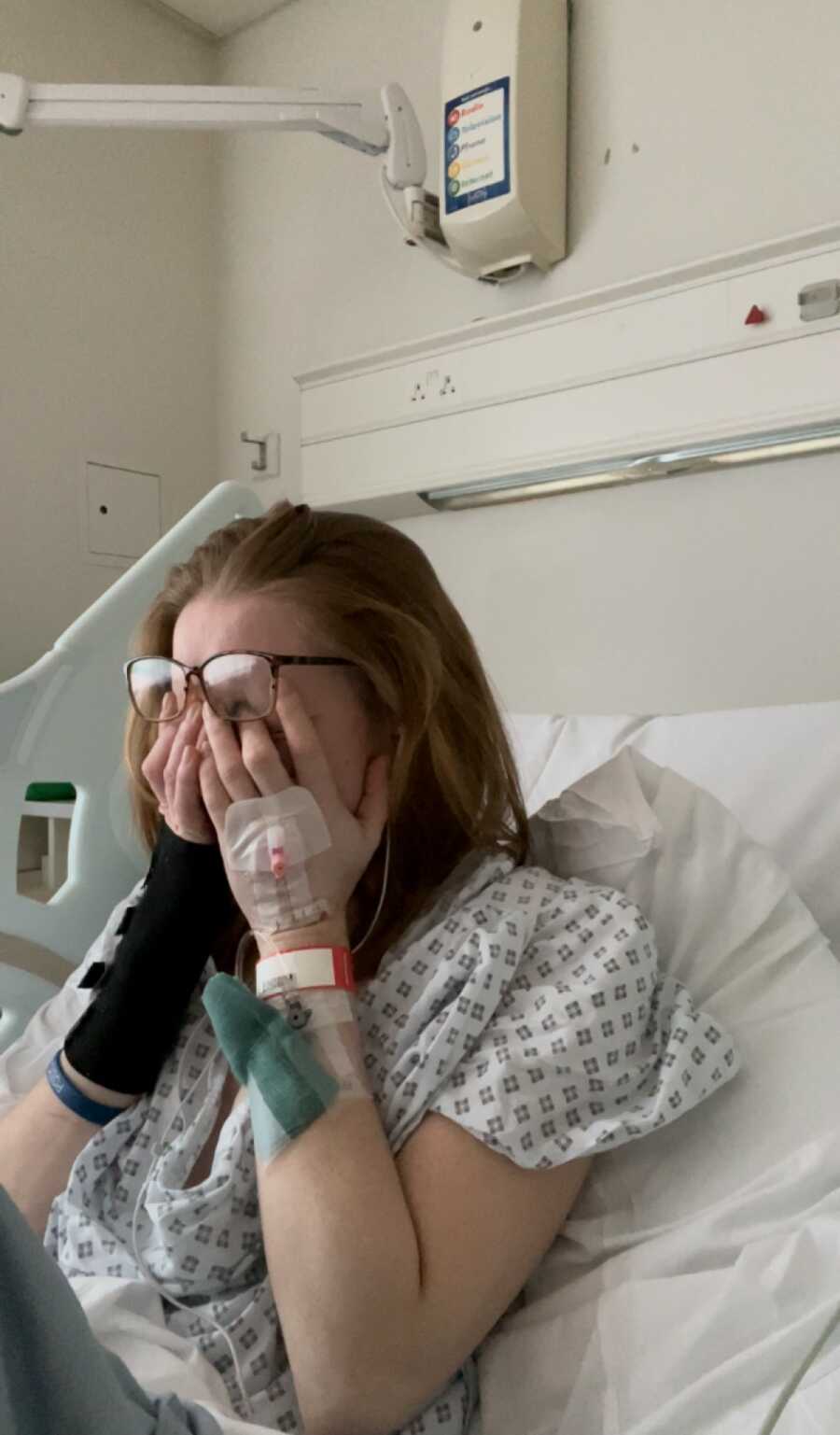 woman in the hospital crying