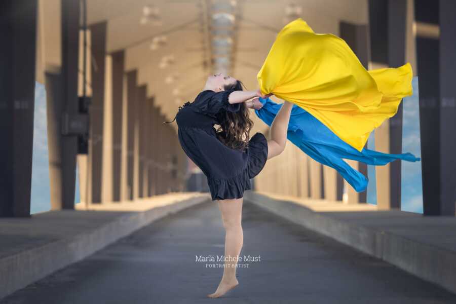 woman with the colors flowing being her