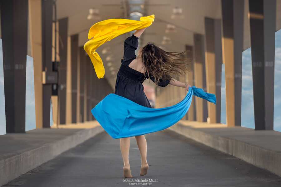 woman twirling the colors 