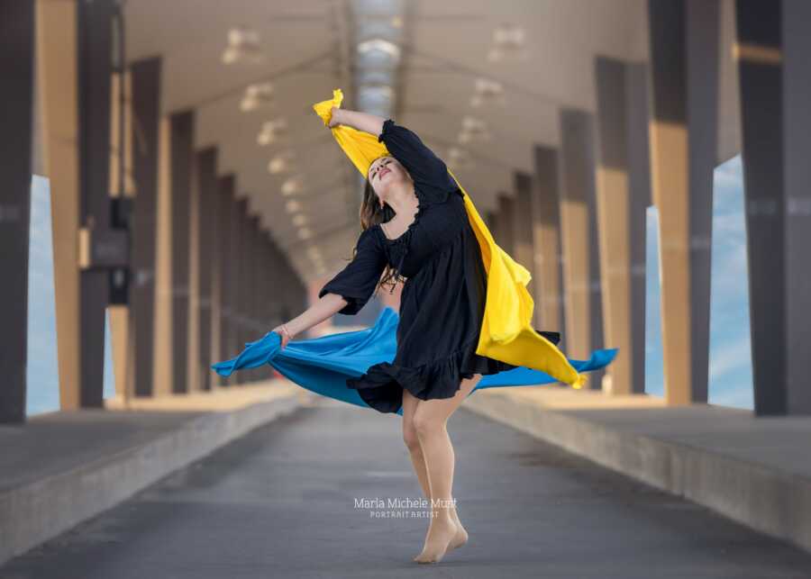 woman with the ukraine colors around her