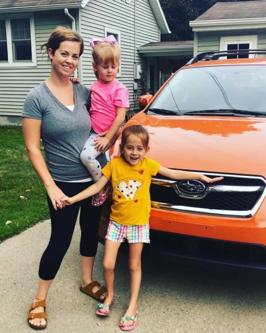 woman with the car that she bought