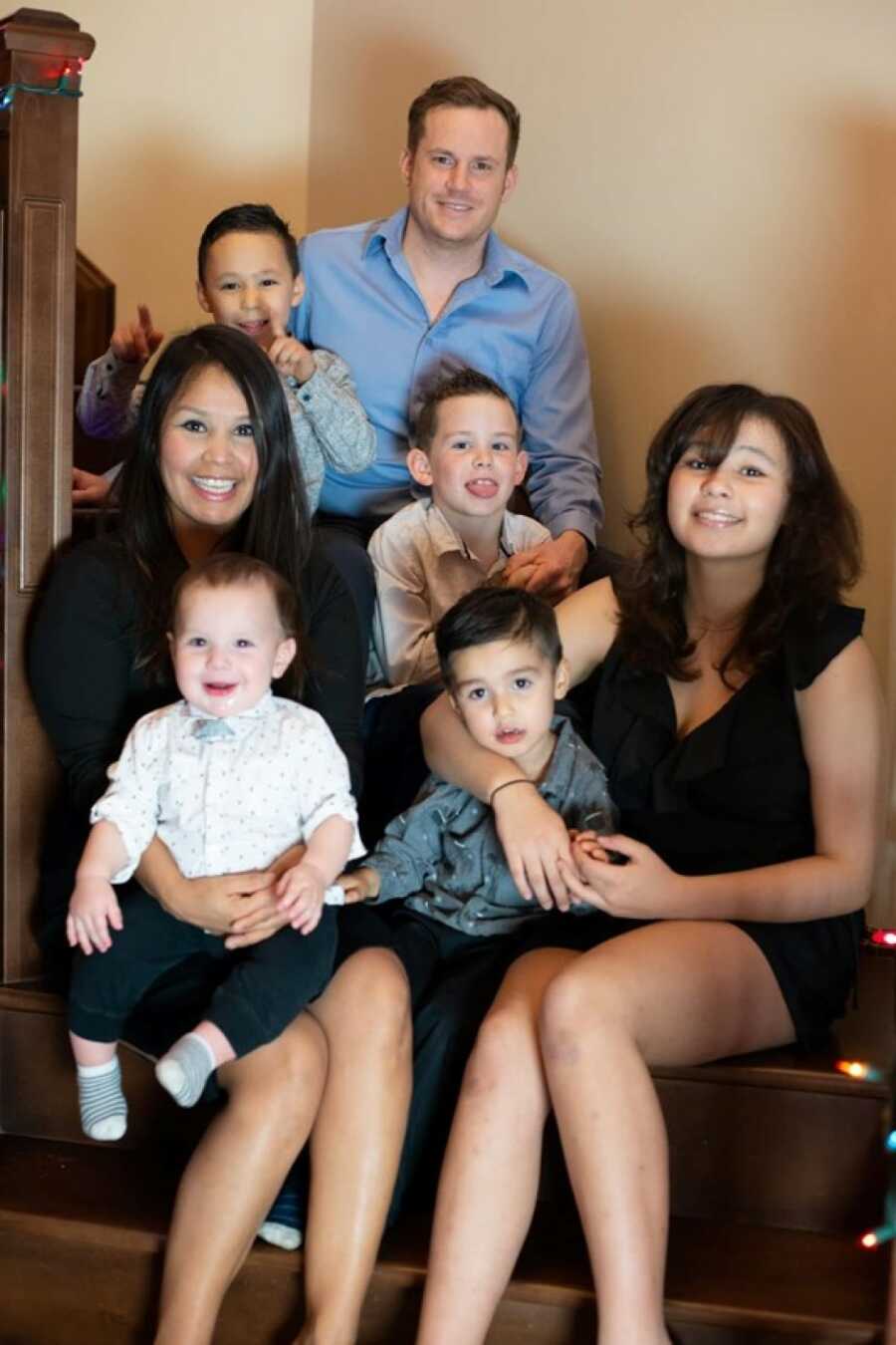 family photos on the stairs 