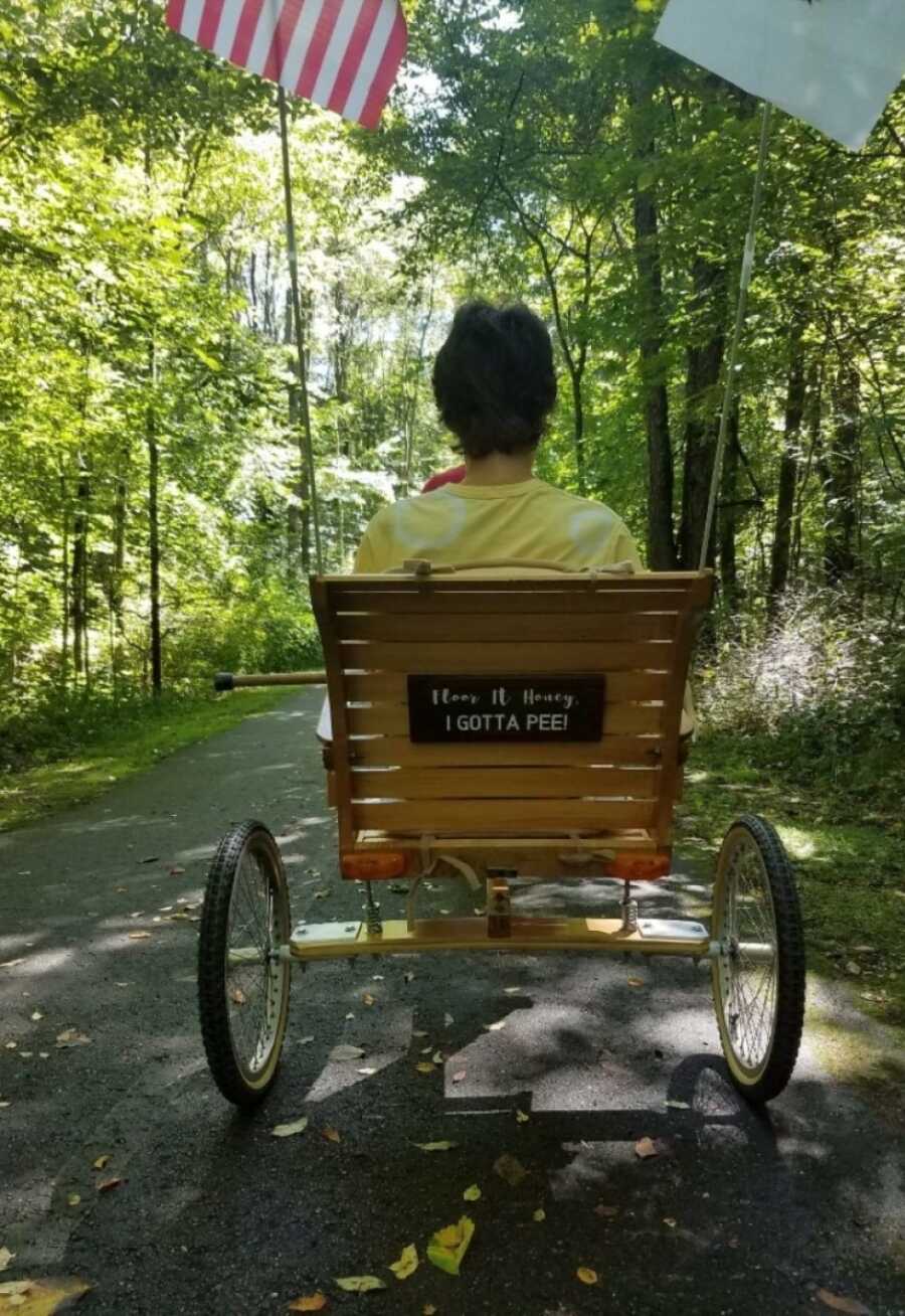 woman in chair her husband built for her