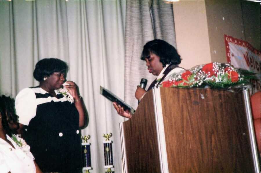 African American woman receiving a Nurse Merit Award