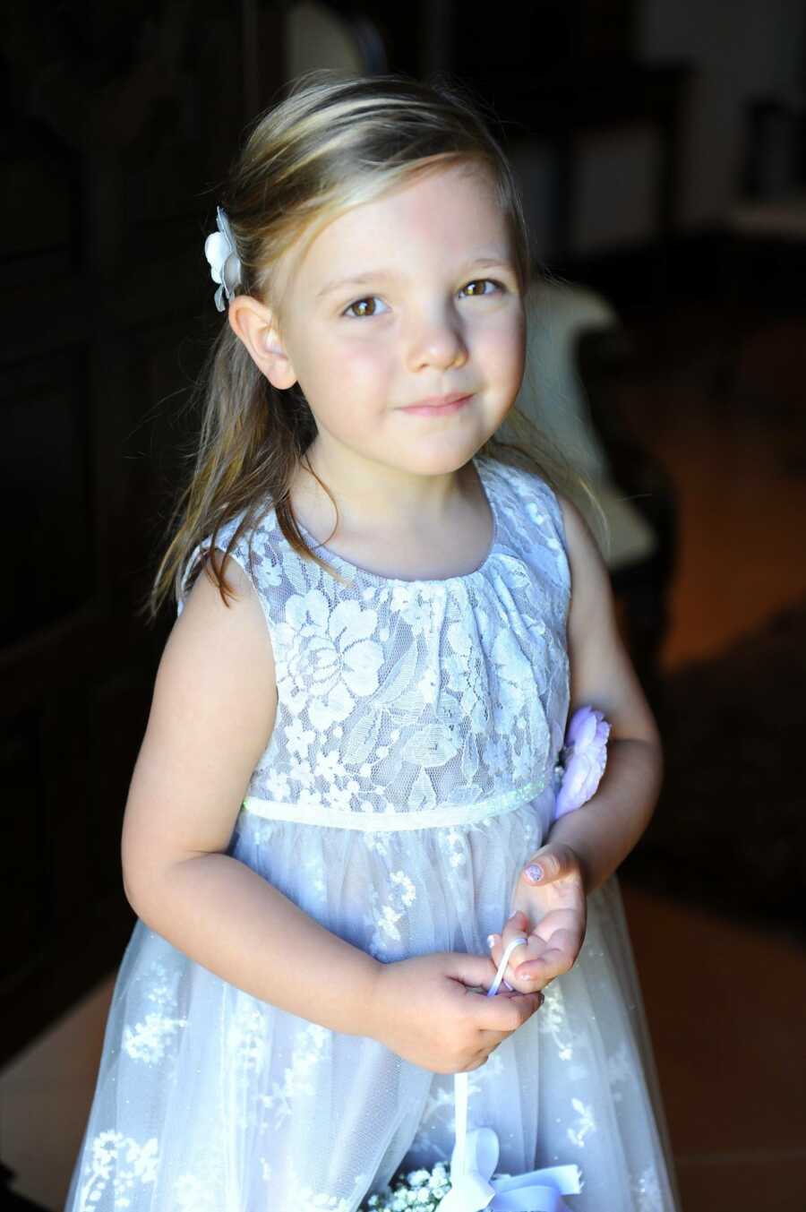little girl looking at the camera