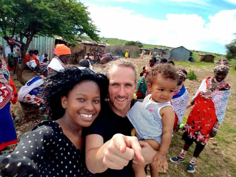 family selfie trying to get daughter to look