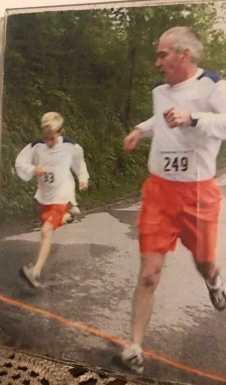 little boy running with dad
