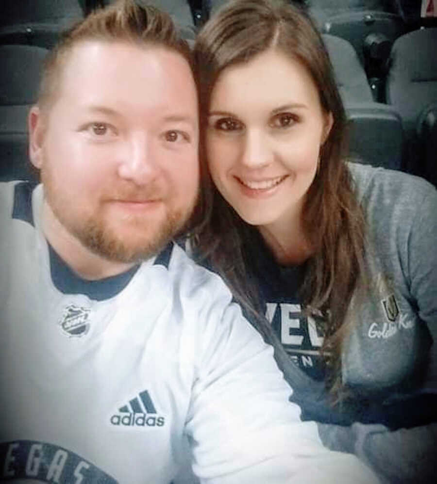 Duchenne parents take a selfie together at a hockey game