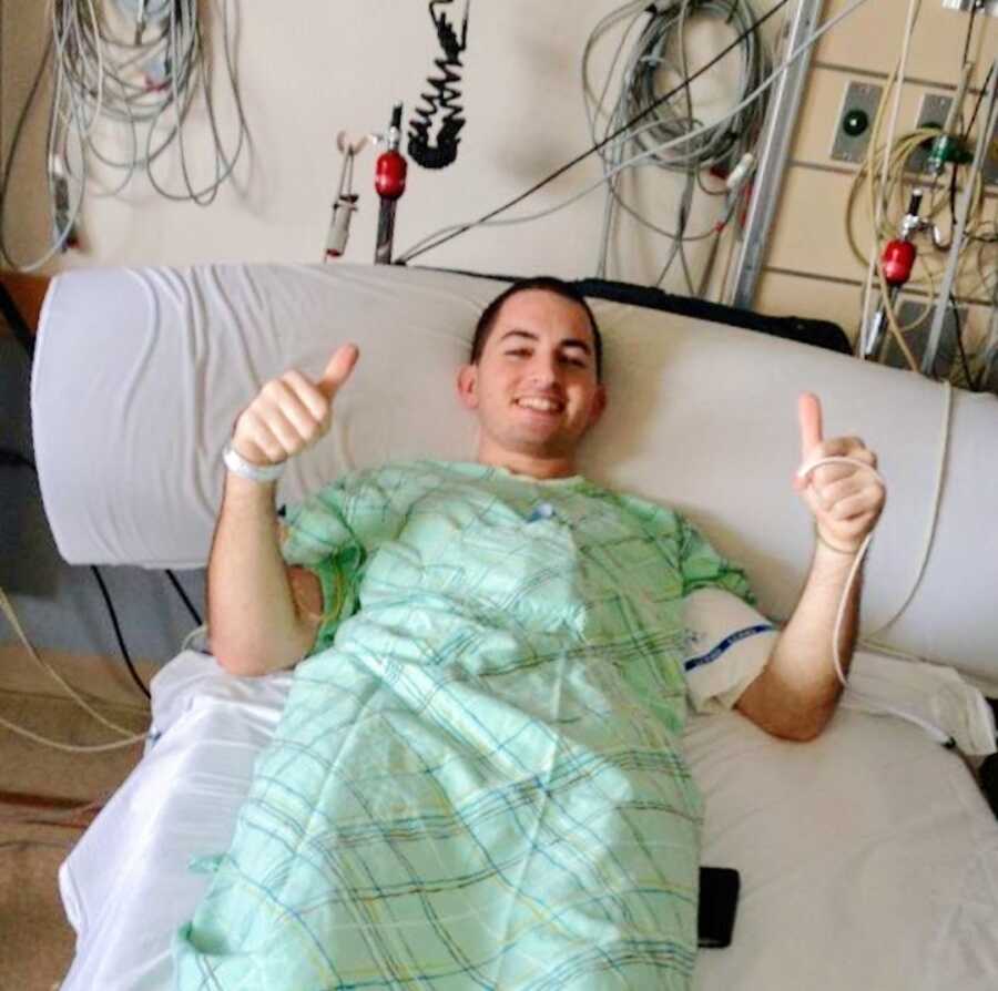 man lays in his hospital bed right before going in for a heart transplant