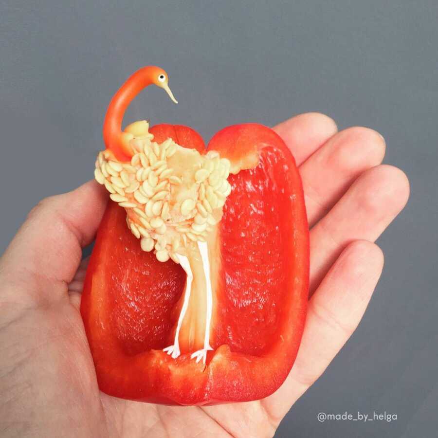 red bell pepper cut in a way that looks like the pepper is a flamingo