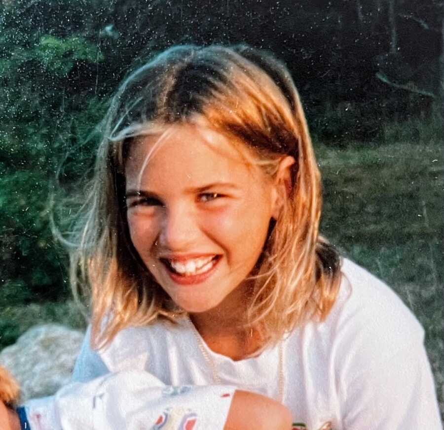 childhood photo of adopted woman
