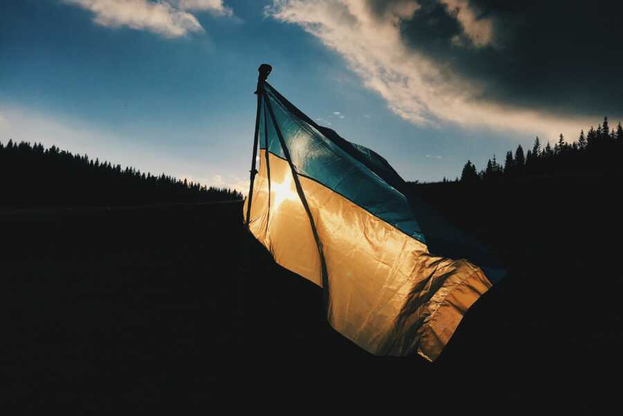 Blue and yellow Ukrainian flag blowing in the wind