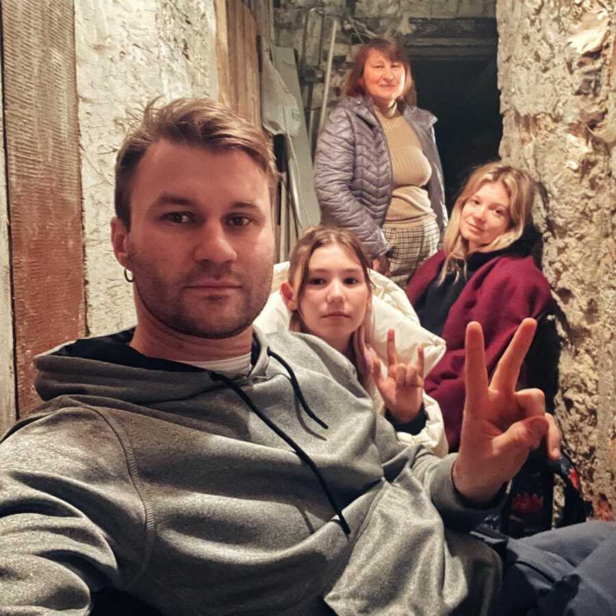 Ukrainian family takes cover in basement of 200 year old building.