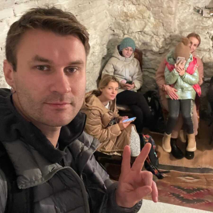 Ukrainian family takes cover in basement of 200 year old building.