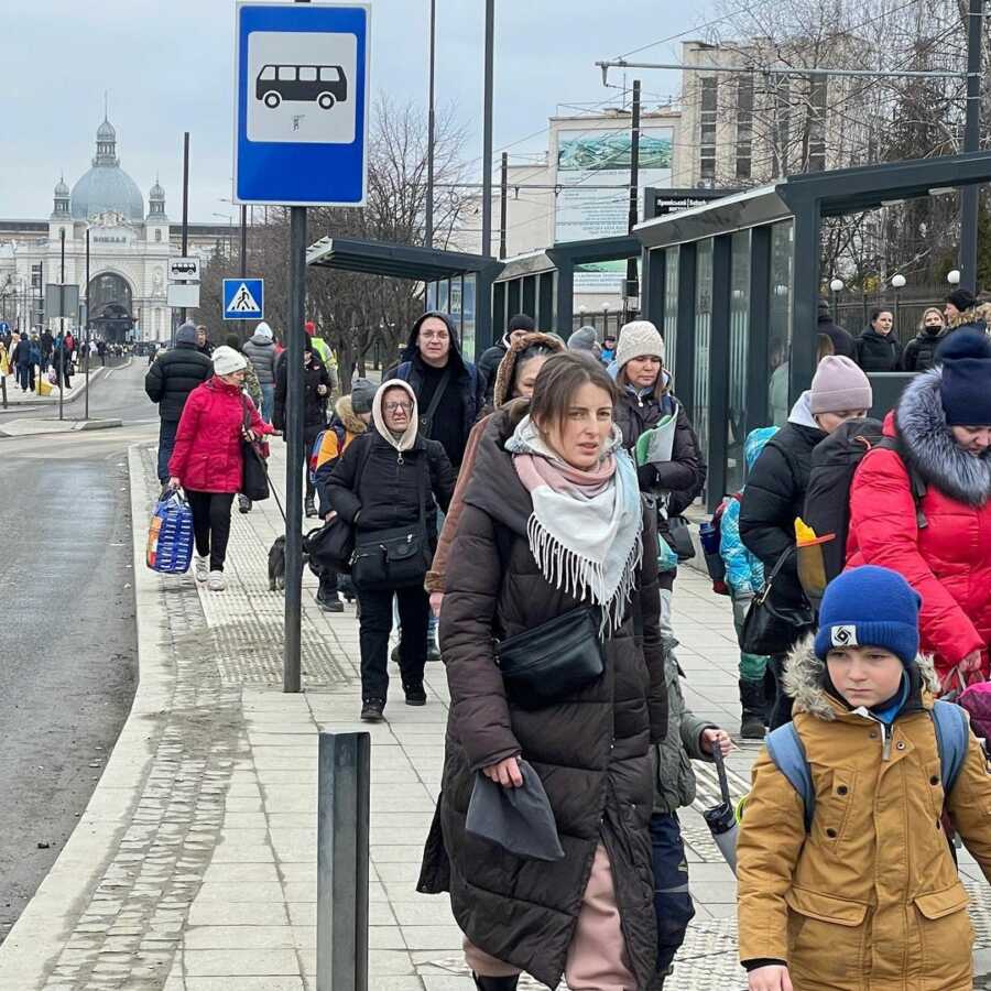 Ukrainian refugees from eastern cities under attack arrive in Lviv.