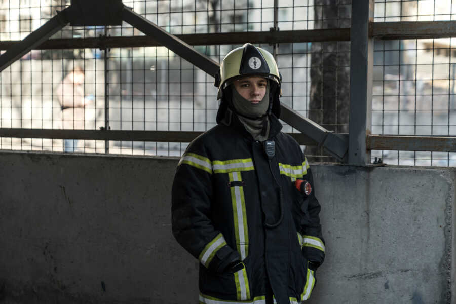 Ukrainian firefighter responds to destruction.