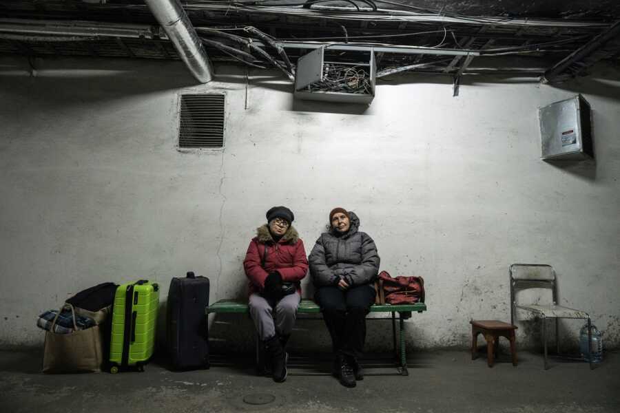 Ukrainians pack suitcases and seek safety.