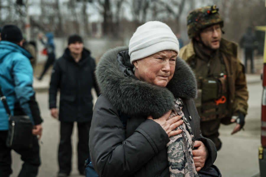 Ukrainian woman trying to evacuate.