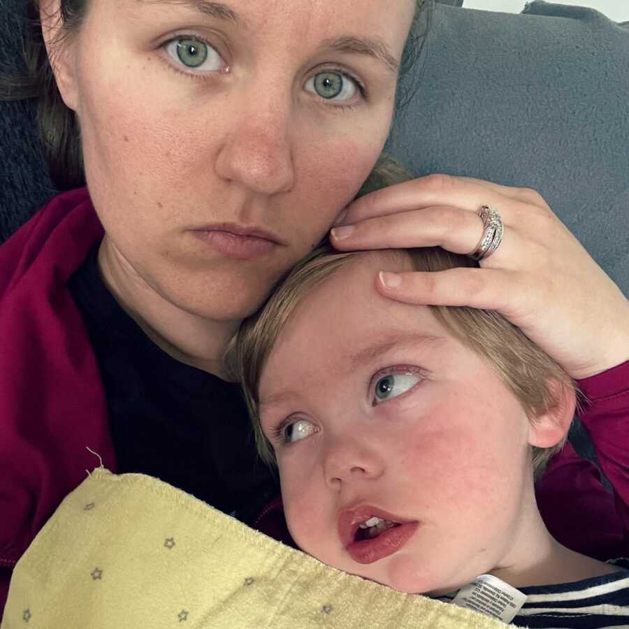 mom holding her son with disabilities close