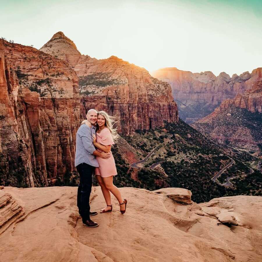 Newly engaged couple take romantic photo together in Zion National Park