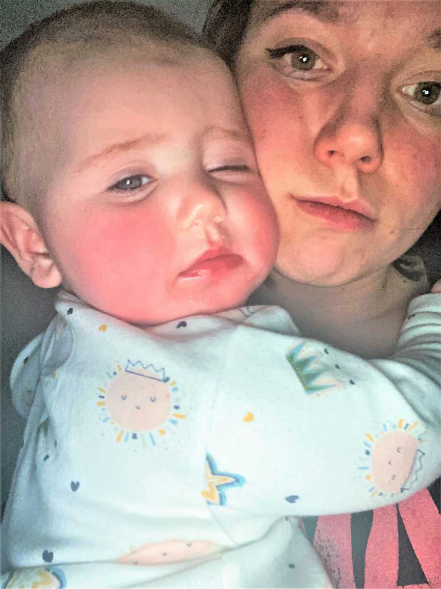 selfie of mom and her baby looking like the just woke up from a nap