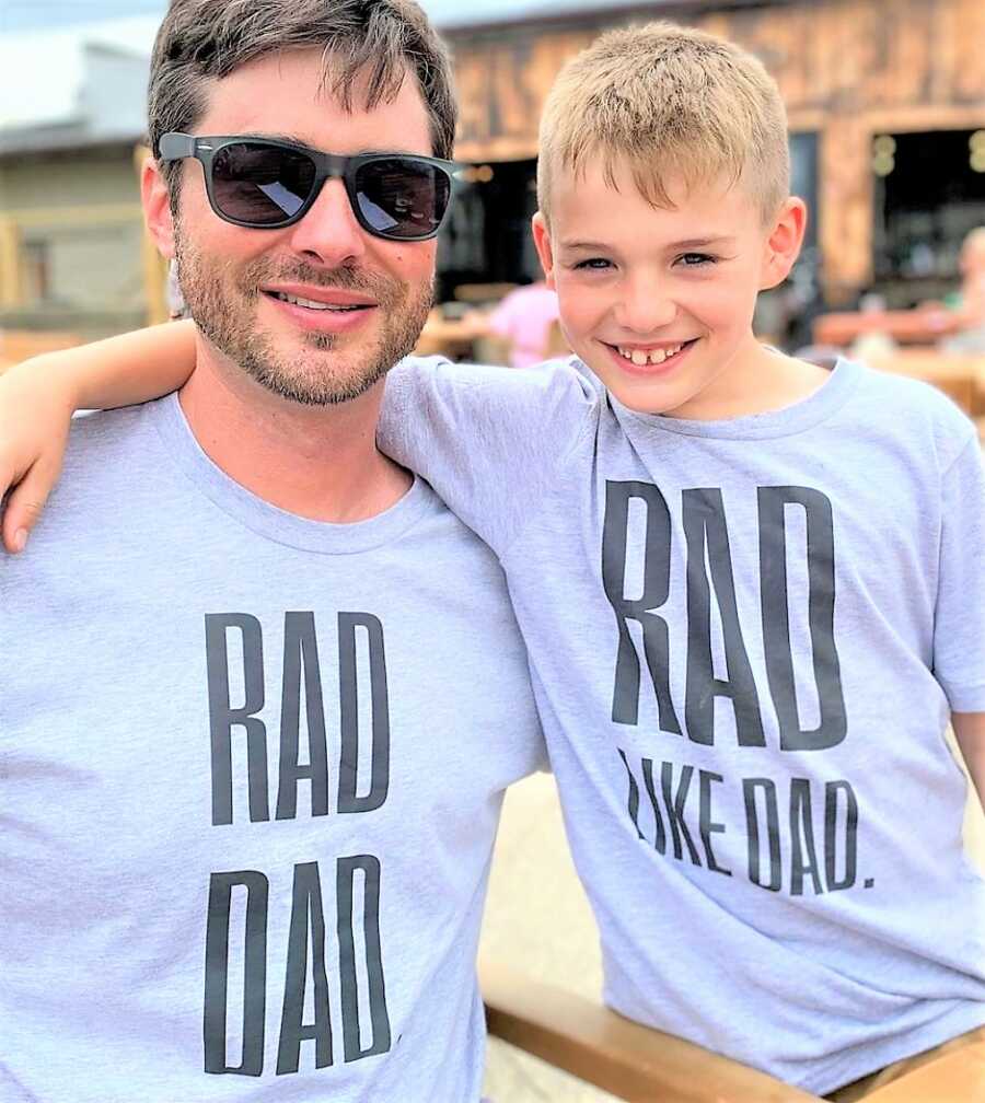father and son wearing t-shirts that say "RAD LIKE DAD" and "RAD DAD"
