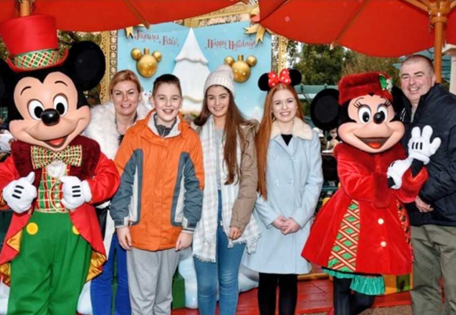Family take a Christmas vacation to Disneyland in Paris