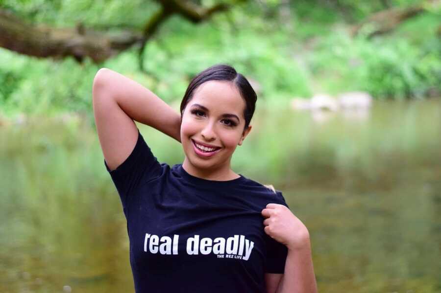 woman posing for a native american company