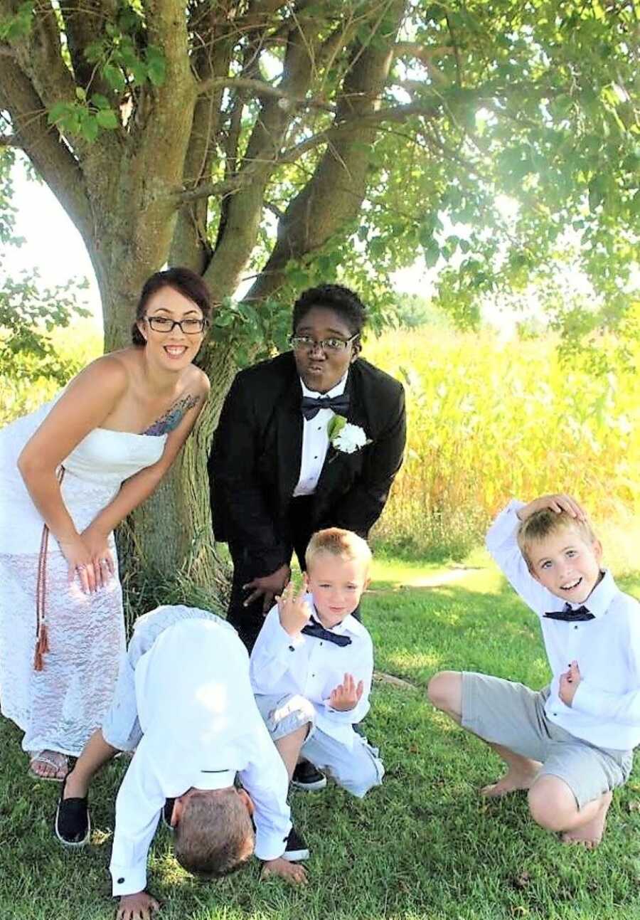 Lesbian couple take silly photos with their sons on their wedding day