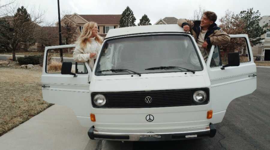 couple in their van that they travel in