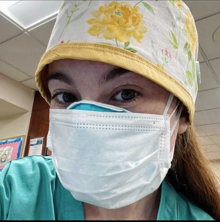ICU nurse takes a selfie while wearing two face masks