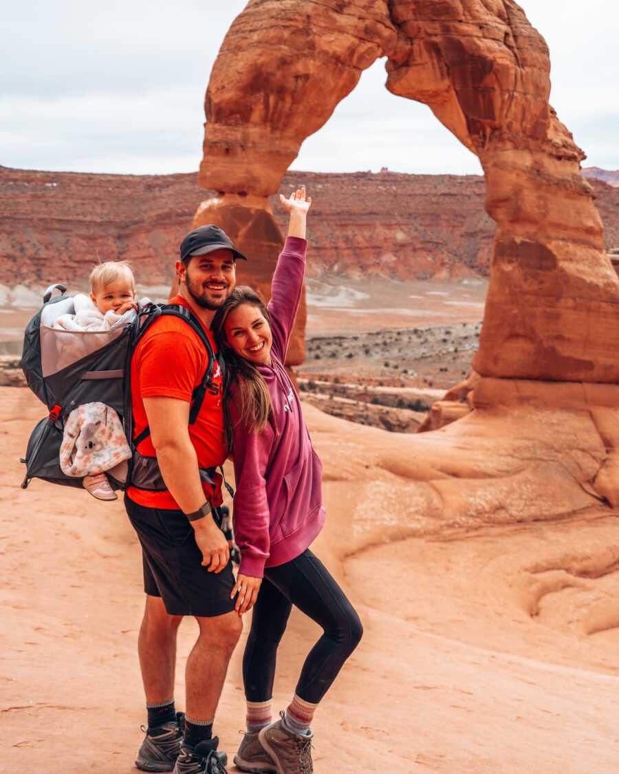 mom dad and baby at the canyon traveling