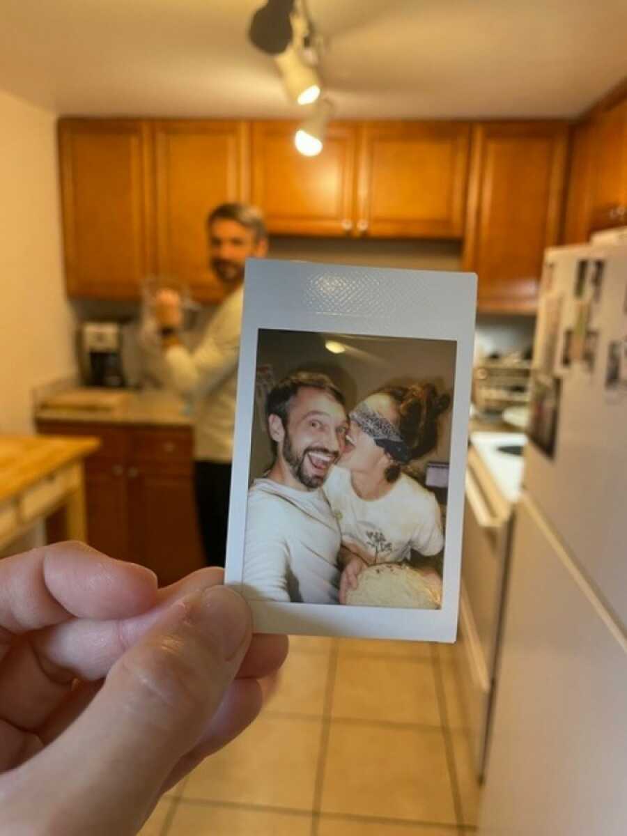 polaroid of couple in kitchen