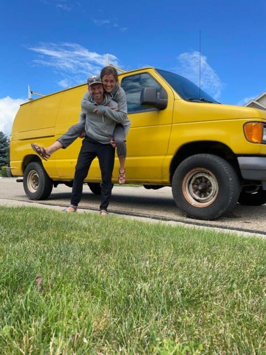 couple in front of their van