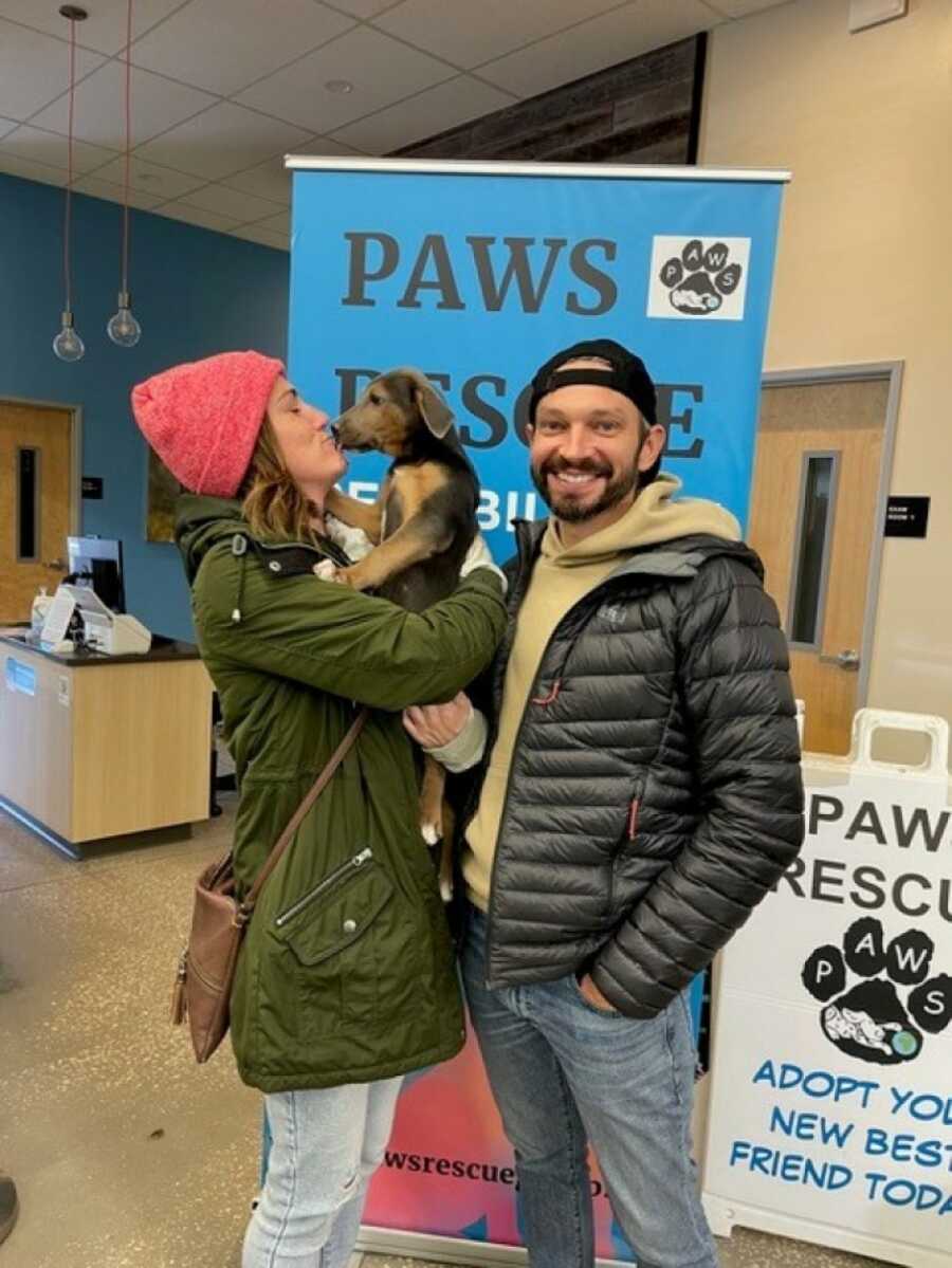 couple adopting another dog