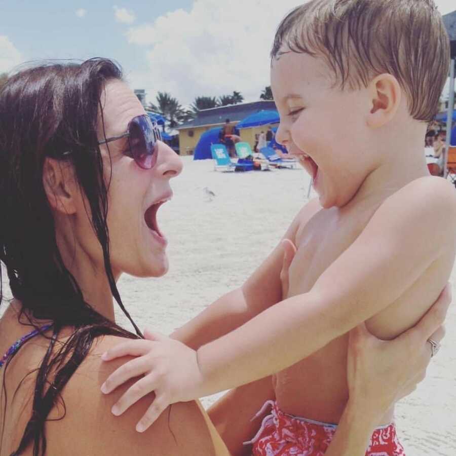 mom and son on the beach