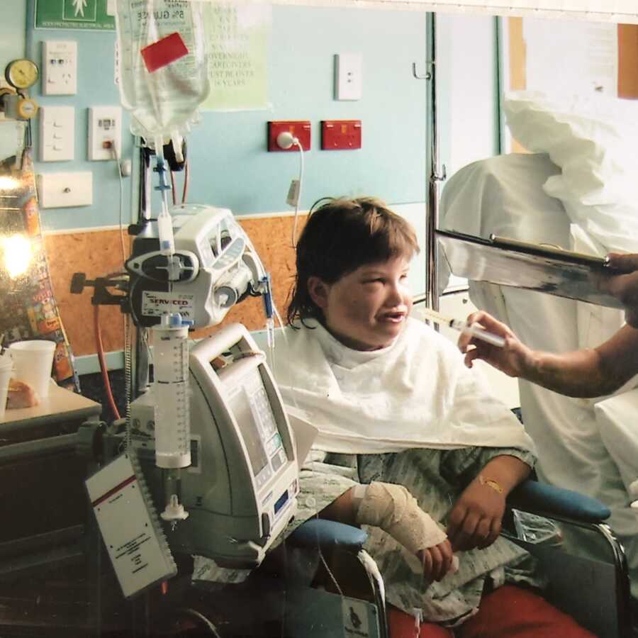 little girl getting her syringe