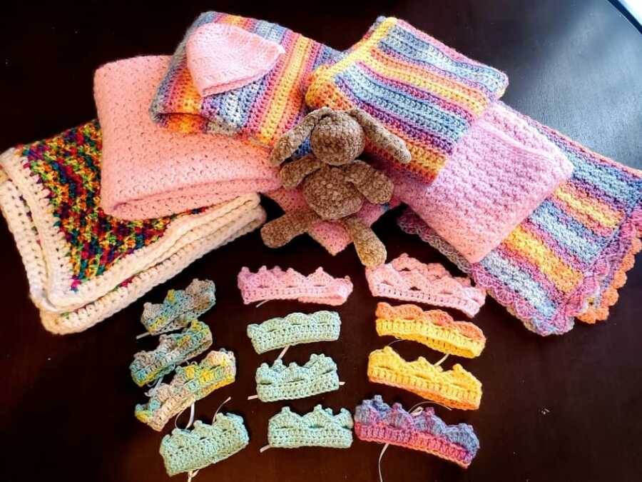 Tiny crochet crowns and baby blankets.
